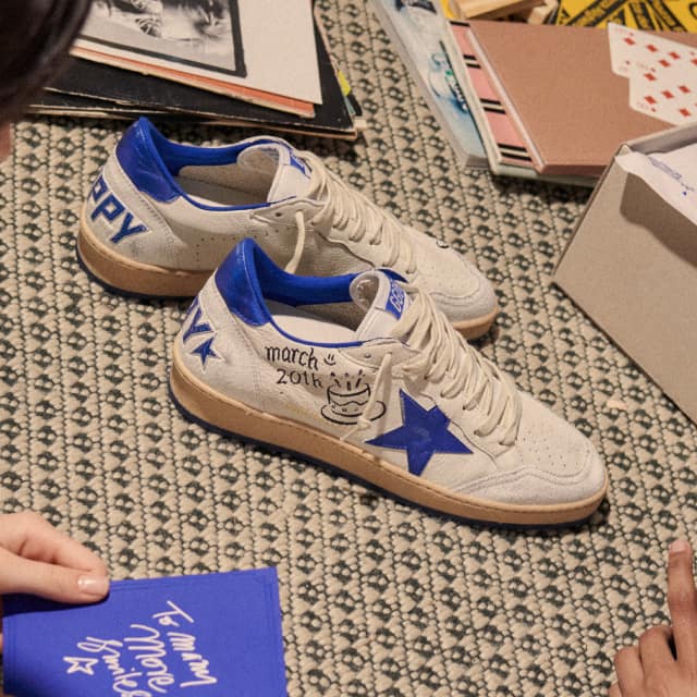 white-leather-ballstar-sneakers-with-blue-details