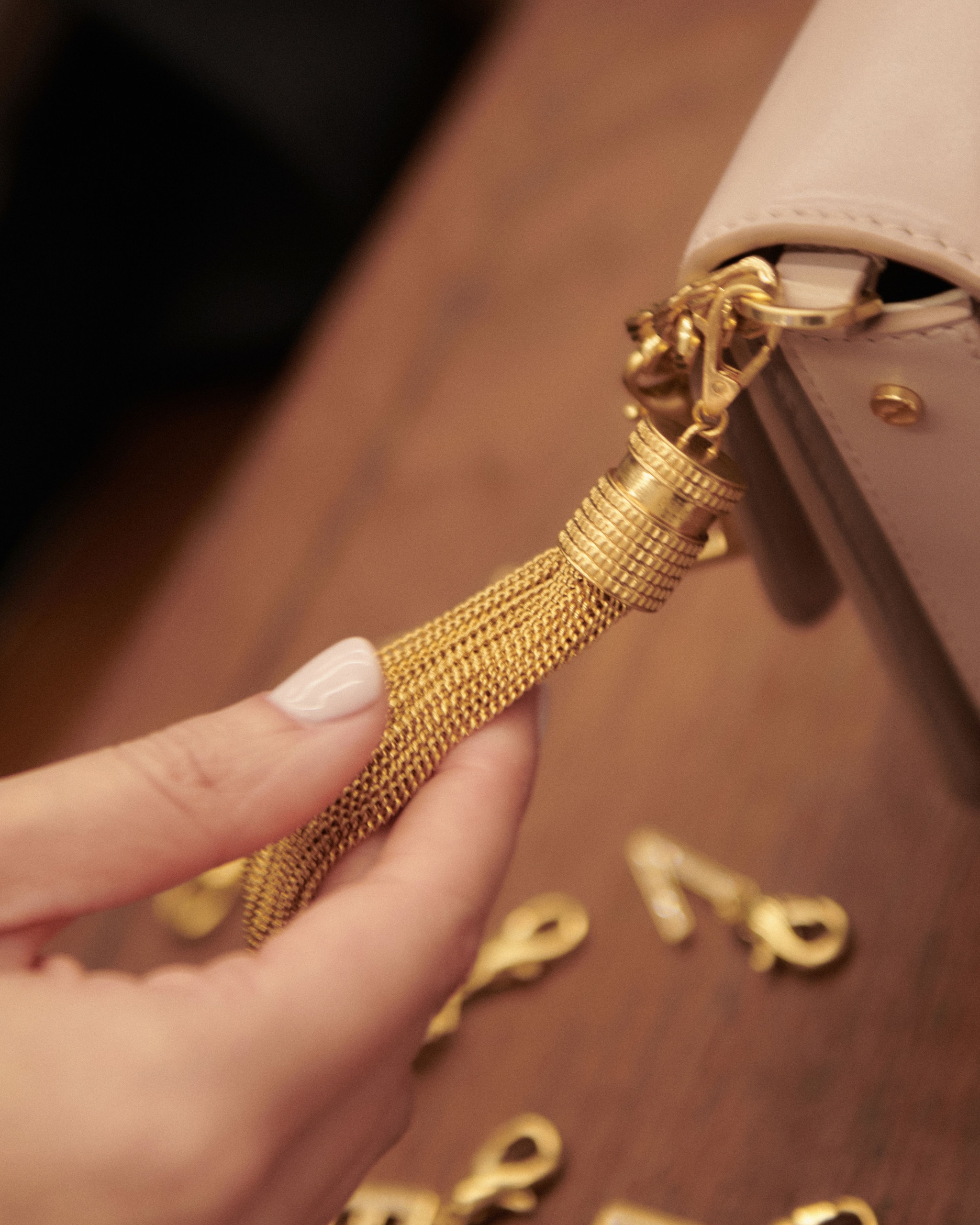 tassel-shaped-charm-in-antique-gold-colored-brass