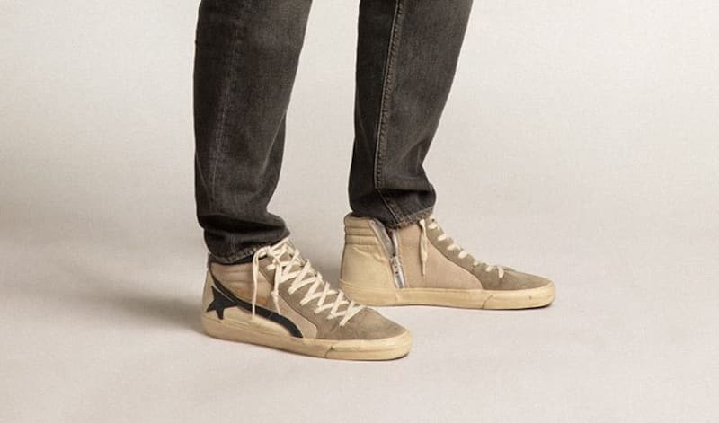 Slide-LTD-sneakers-in-green-suede-close-to-books