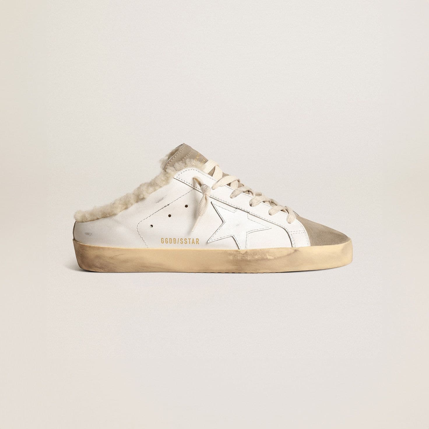 Super-Star-Sabots-with-white-leather-star-and-shearling-lining