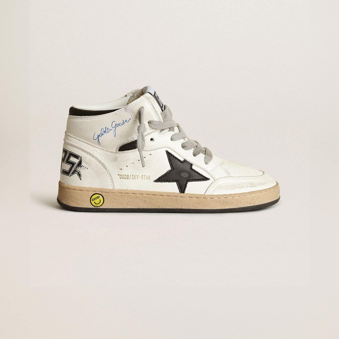 Young-Sky-Star-in-white-nappa-with-black-star-and-heel-tab