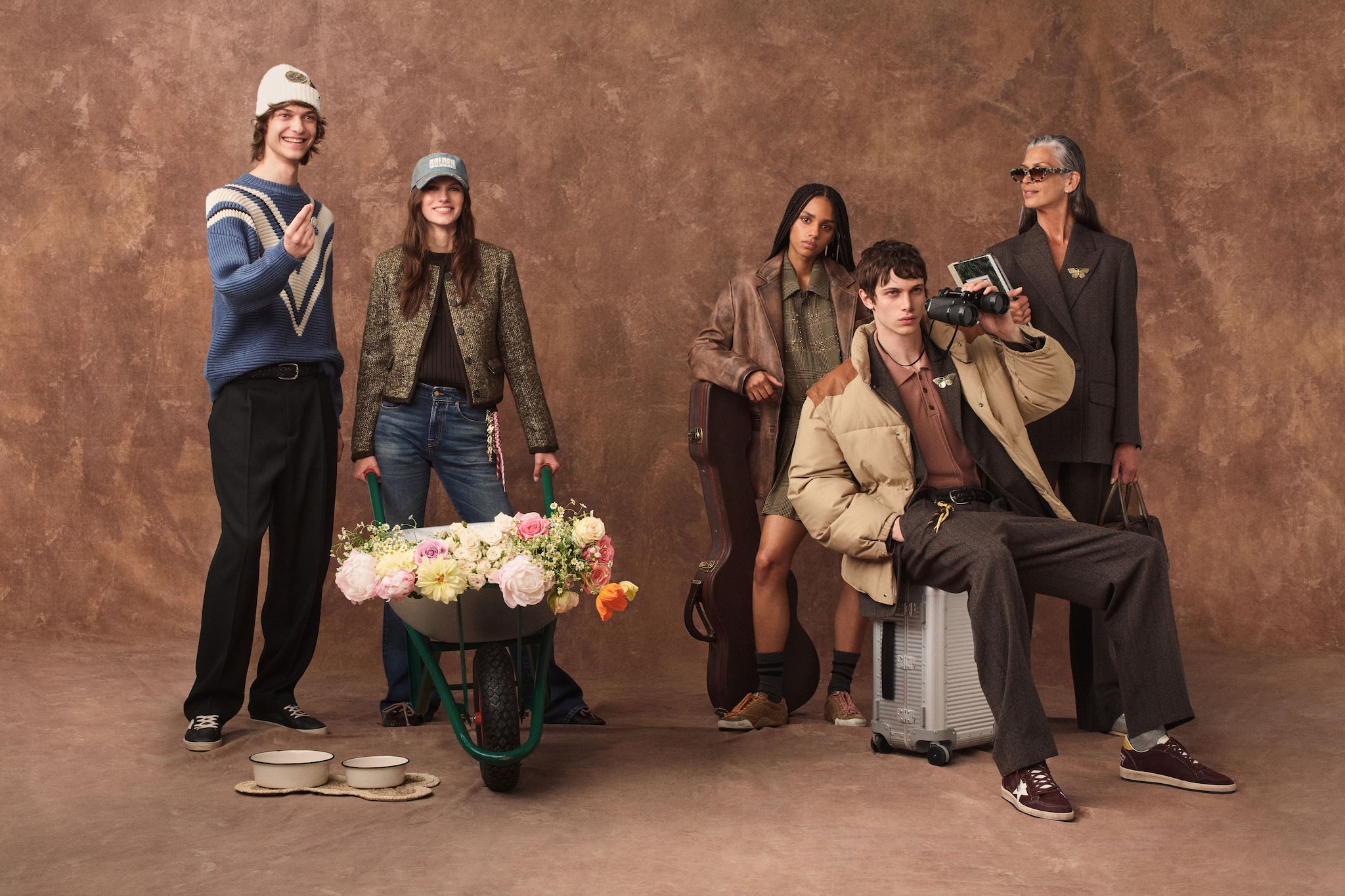 fall-winter-collection-models-groupage-on-a-brown-neutral-background