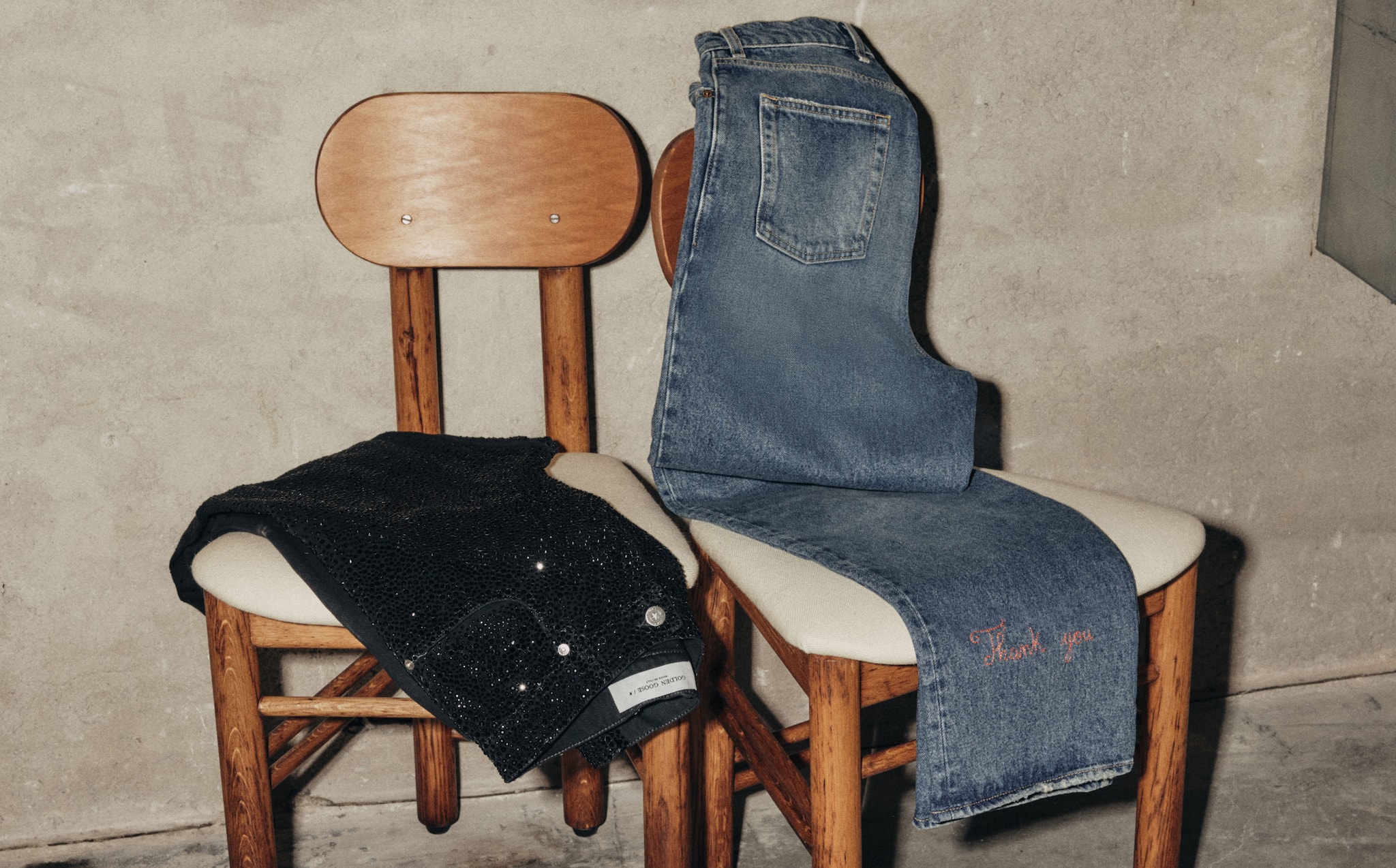 couple-of-denim-icon-pants-on-chairs