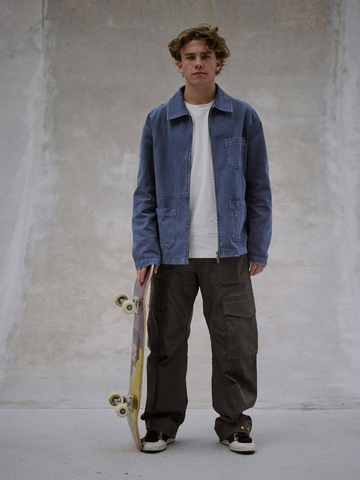 portrait-of-keegan-palmer-with-his-skateboard