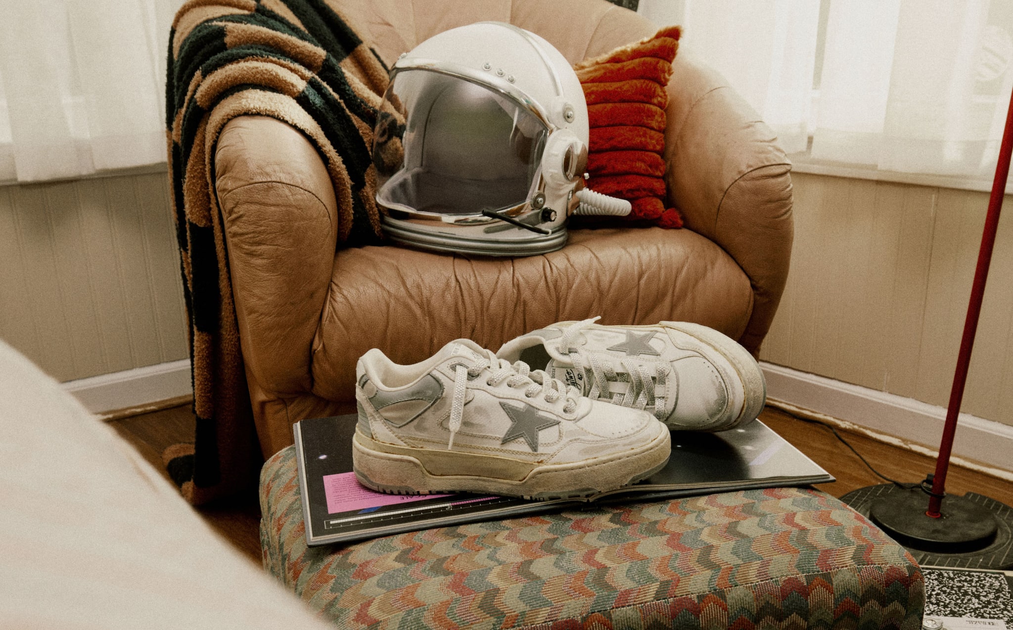 forty2-sneakers-with-silver-star-in-a-bedroom