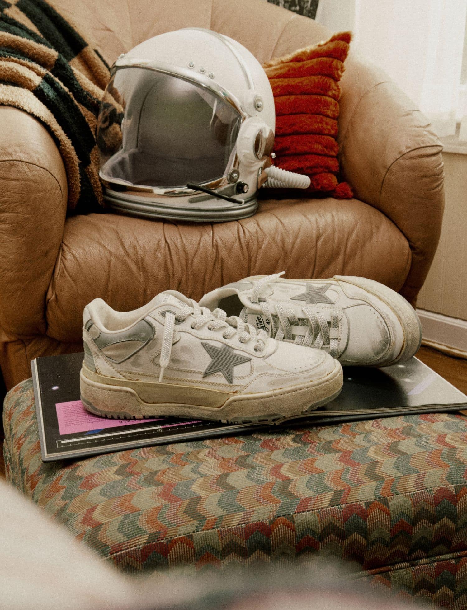 forty2-sneakers-with-silver-star-in-a-bedroom