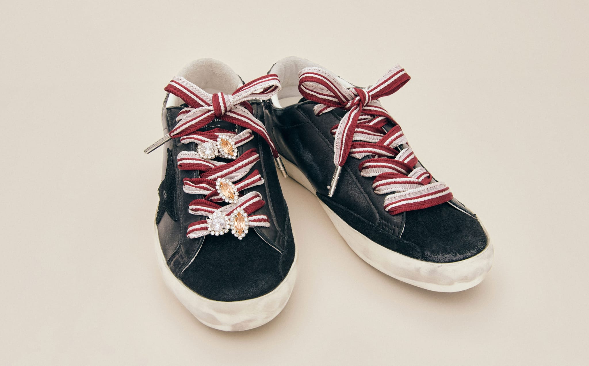 black-sneakers-with-golden-skins