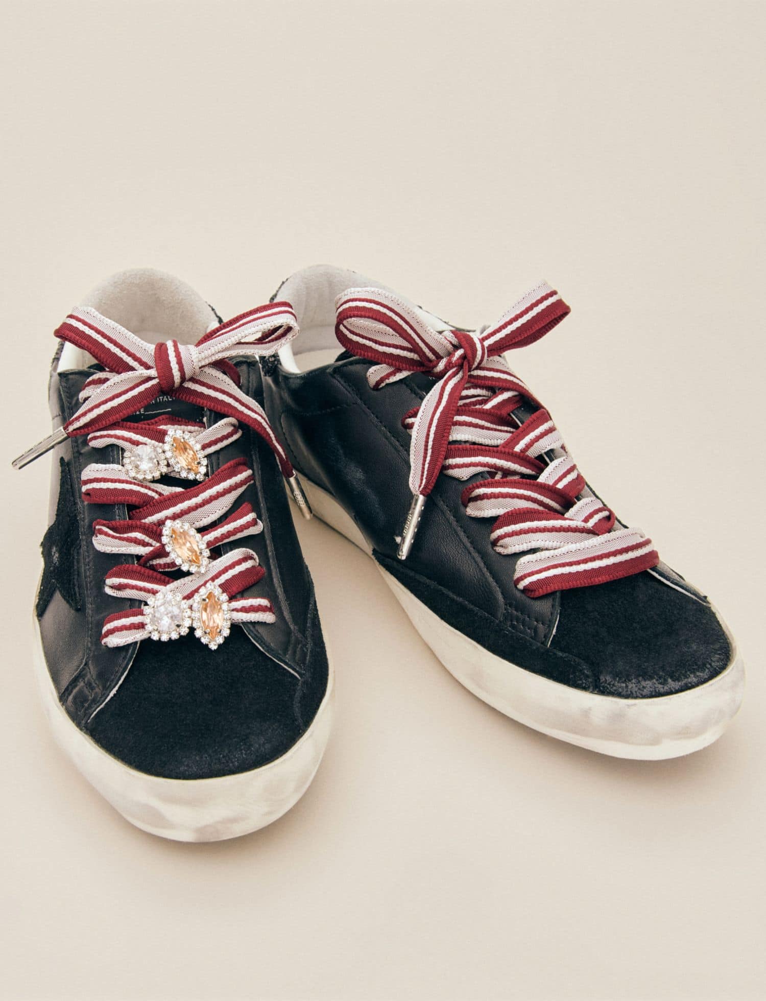 black-sneakers-with-golden-skins