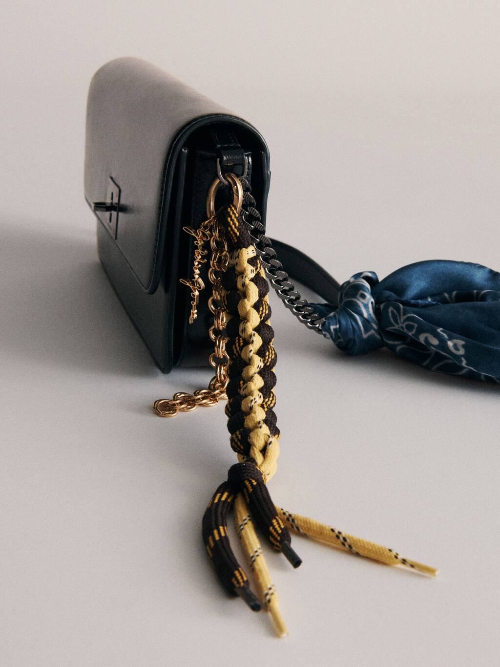 black-leather-gioia-bag-with-charms