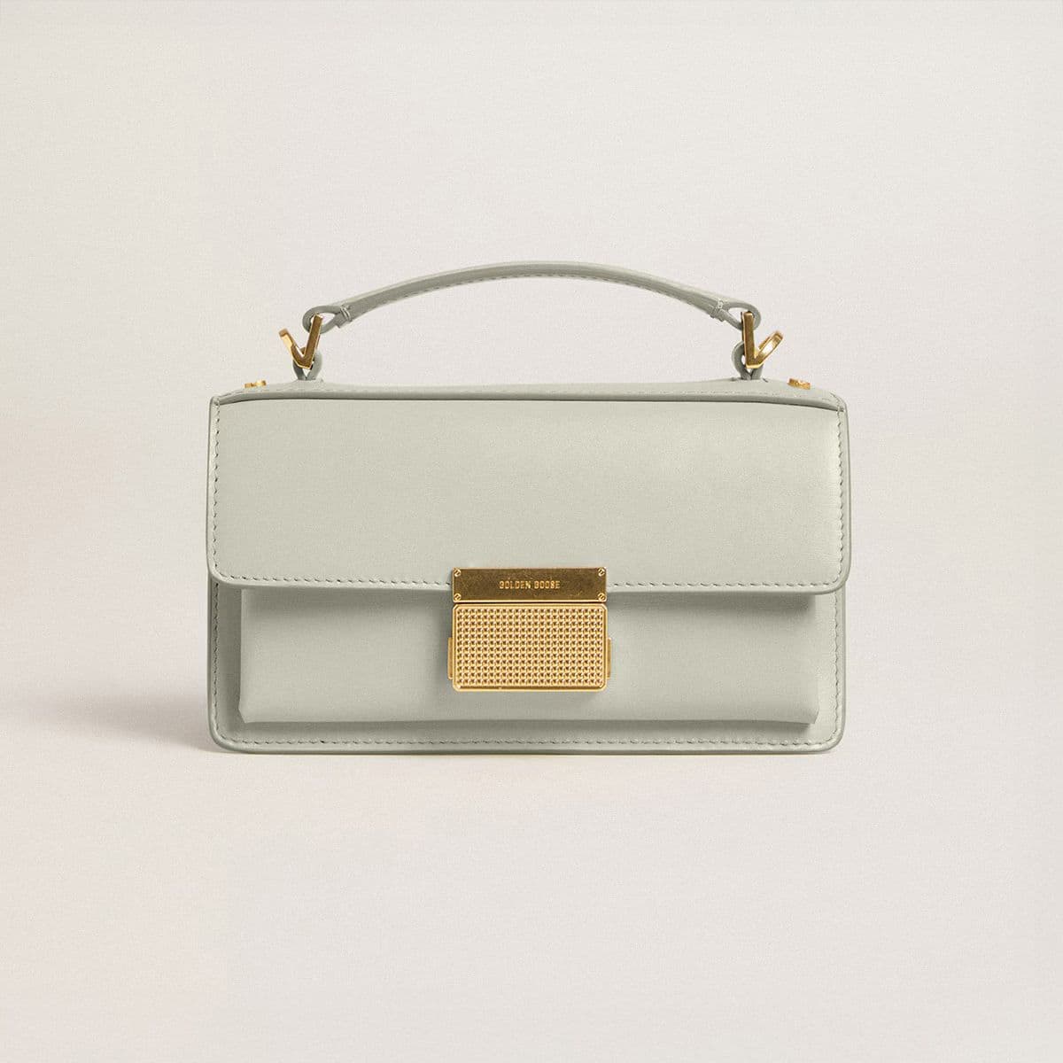 light-green-venezia-bag-on-neutral-background