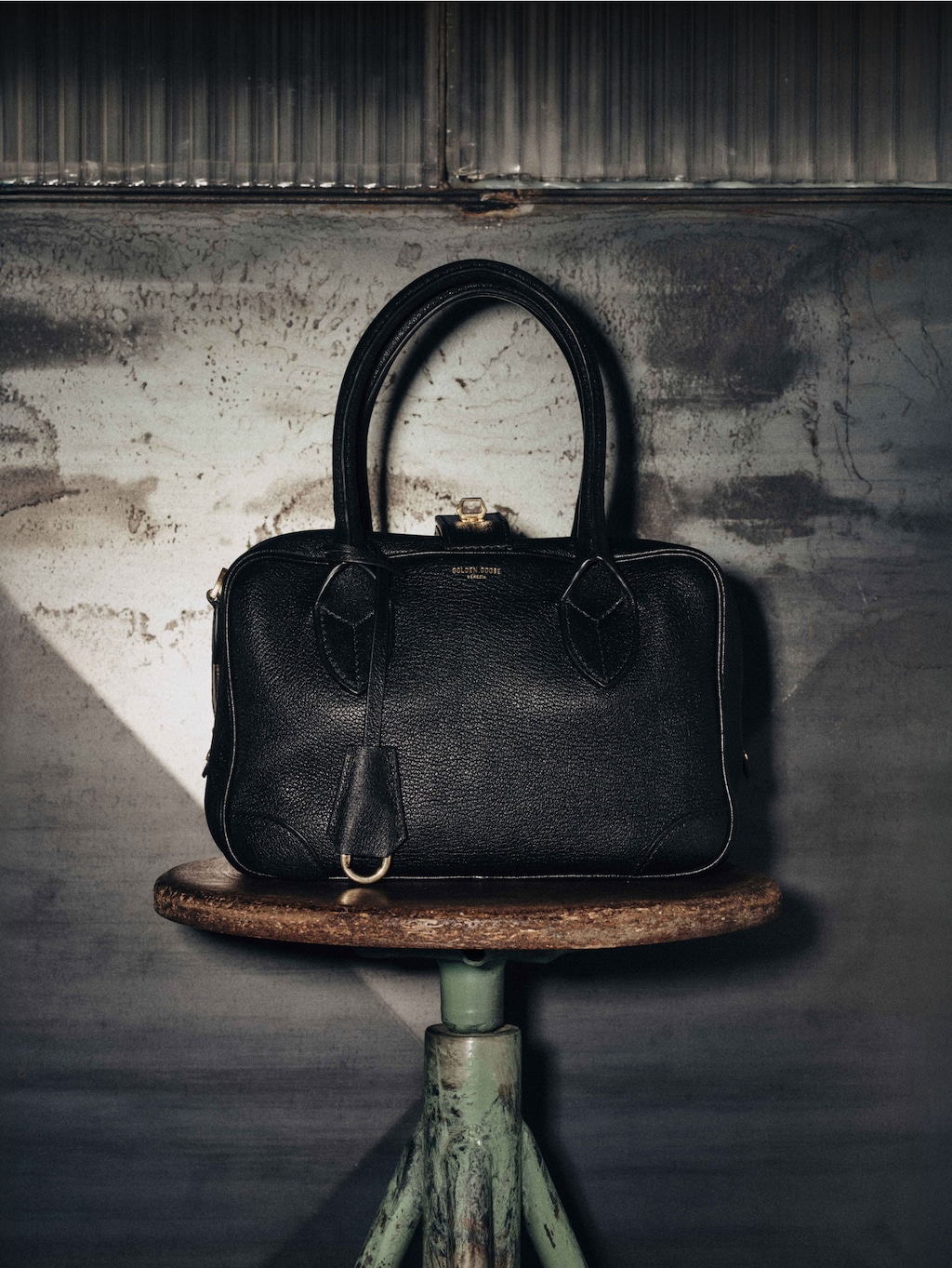black-leather-vita-bags-on-a-stool