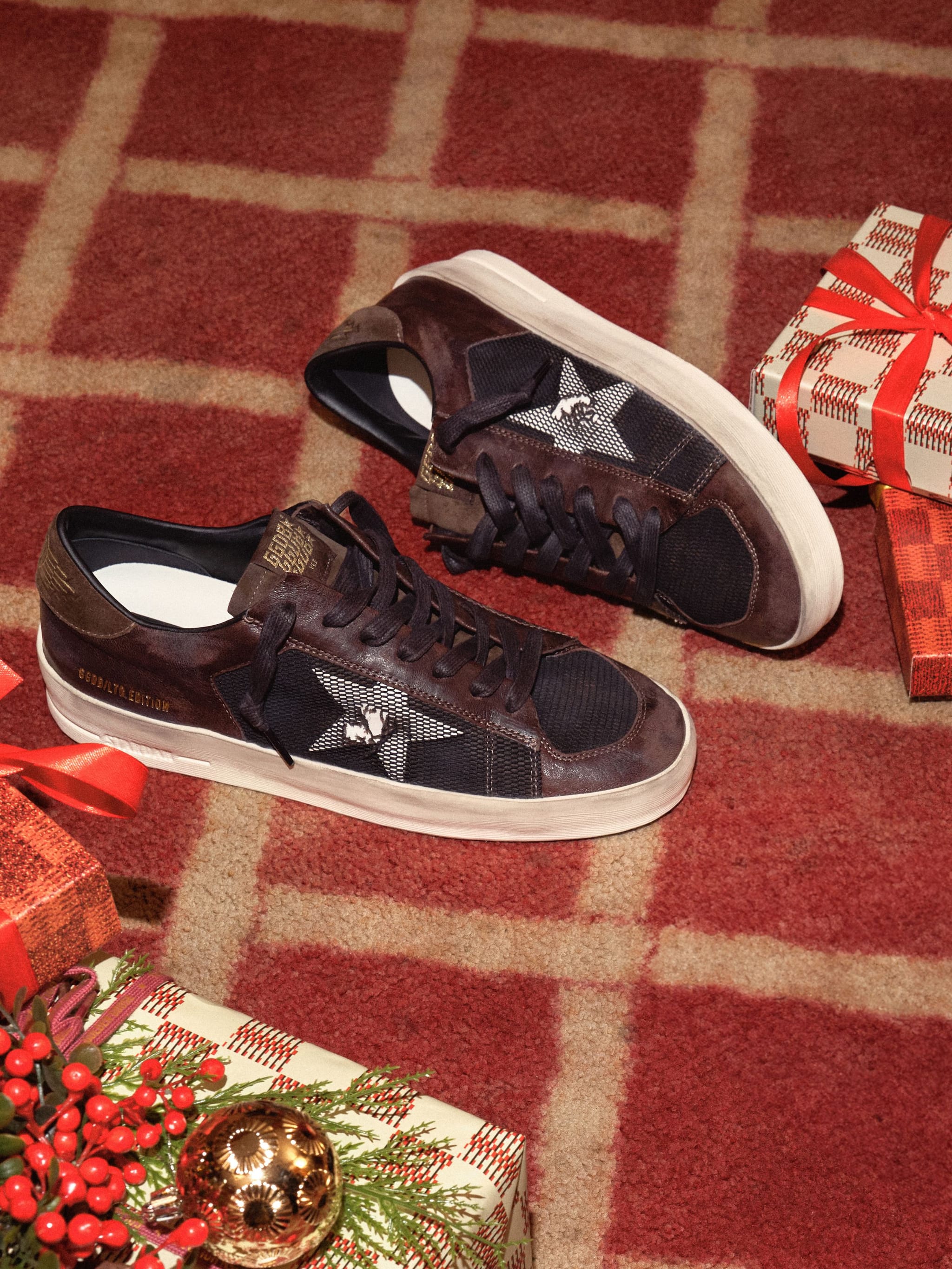 brown-and-black-stardan-sneakers-on-the-floor