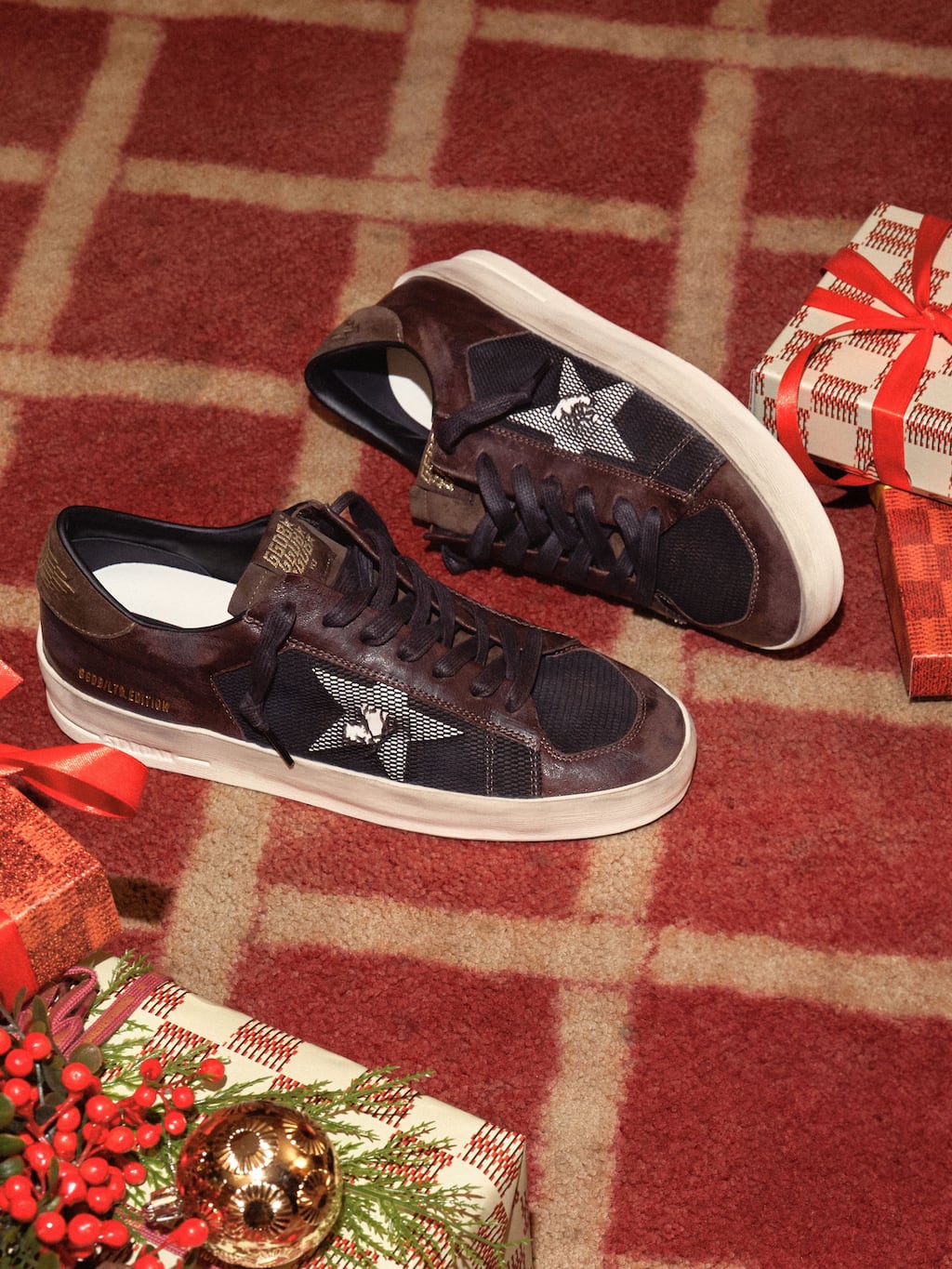 brown-and-black-stardan-sneakers-on-the-floor