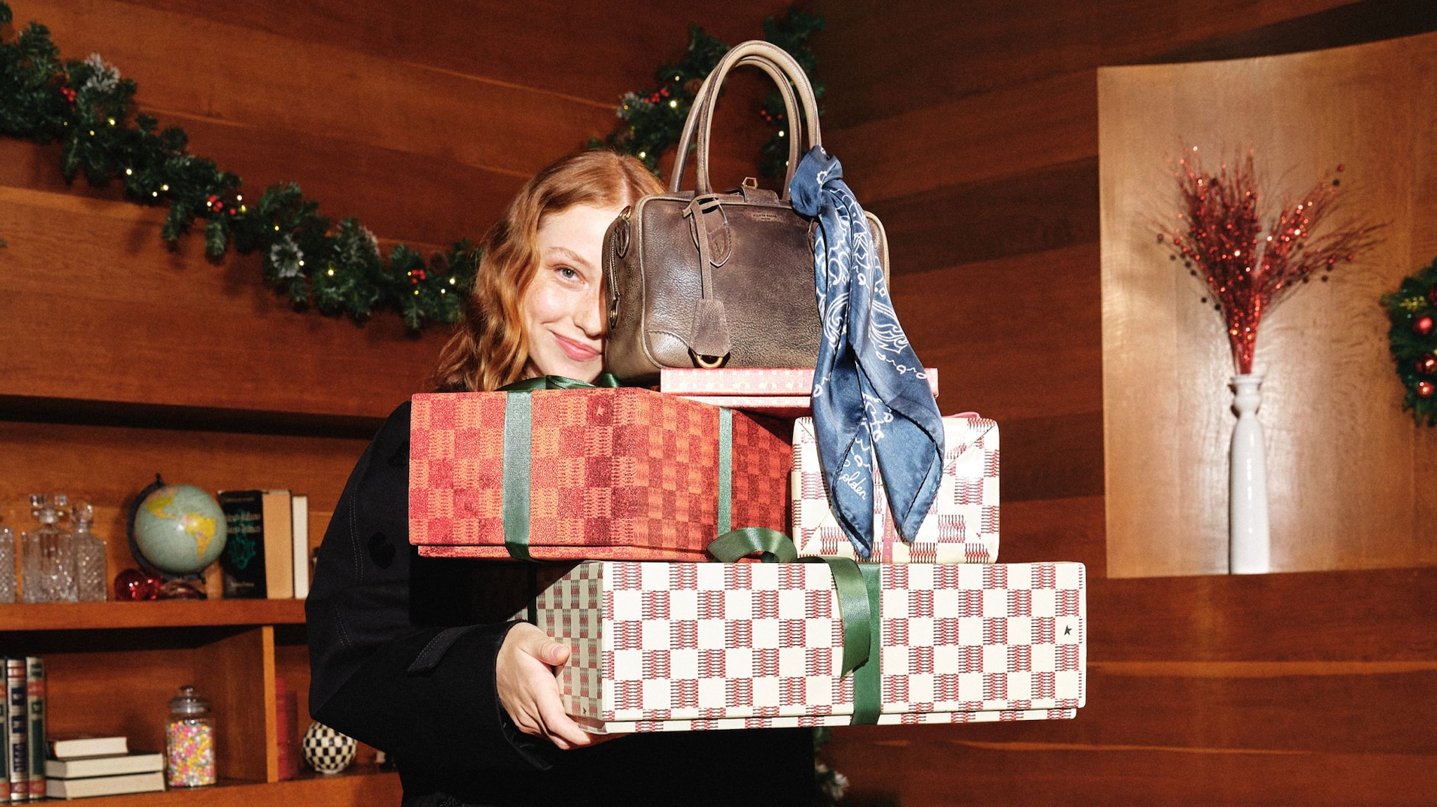 female-model-with-christmas-gifts