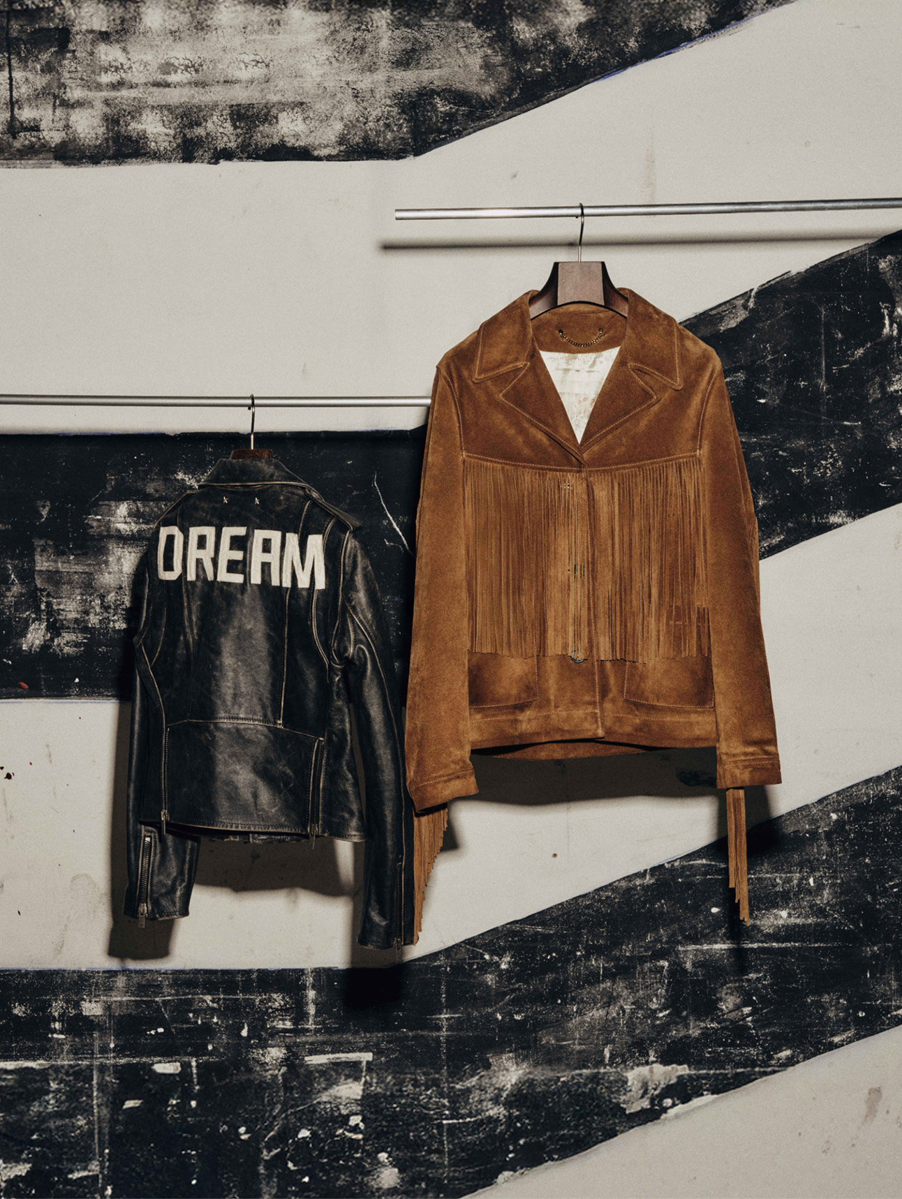 black-leather-biker-and-brown-leather-jacket-hanging