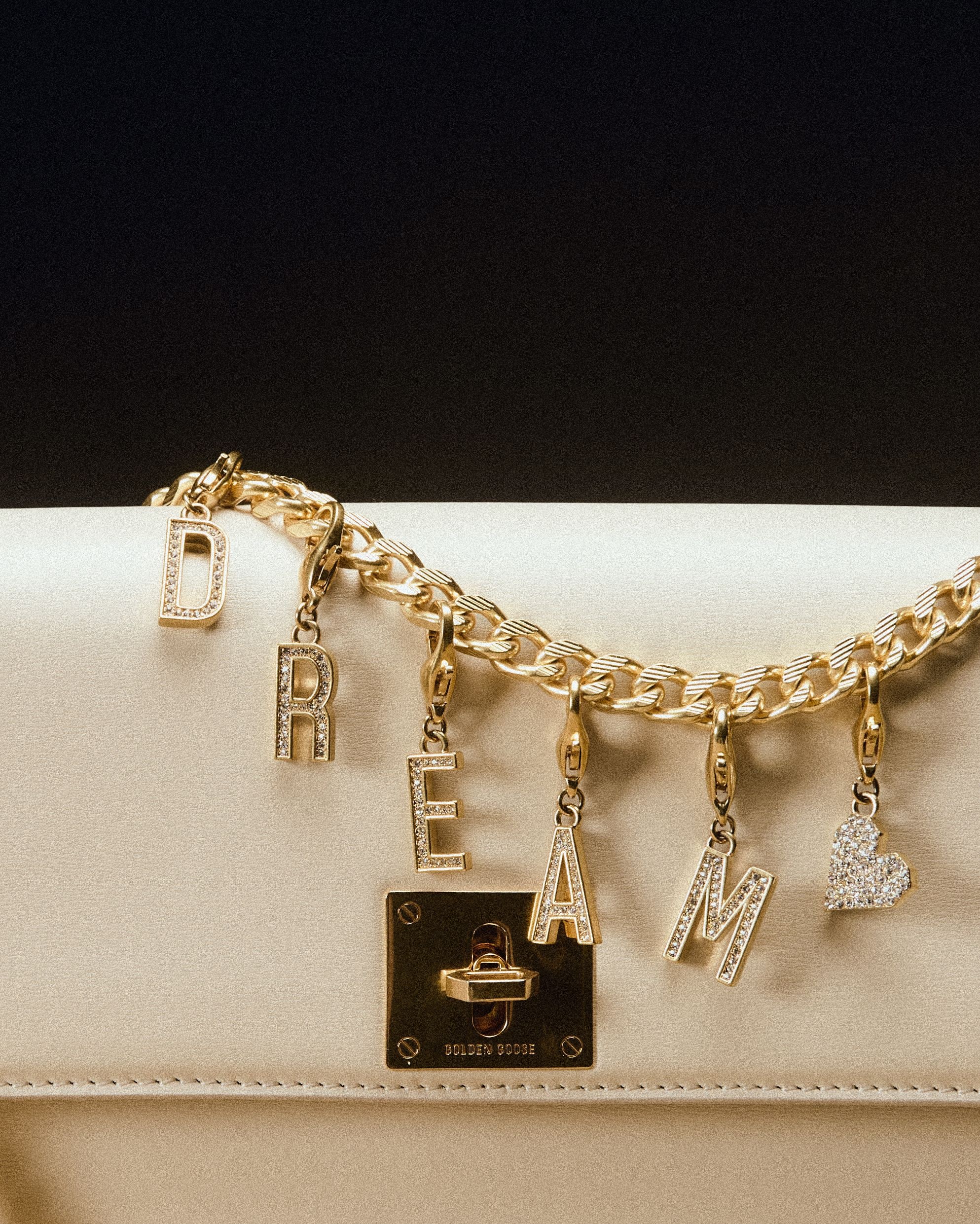 white-bag-with-charm