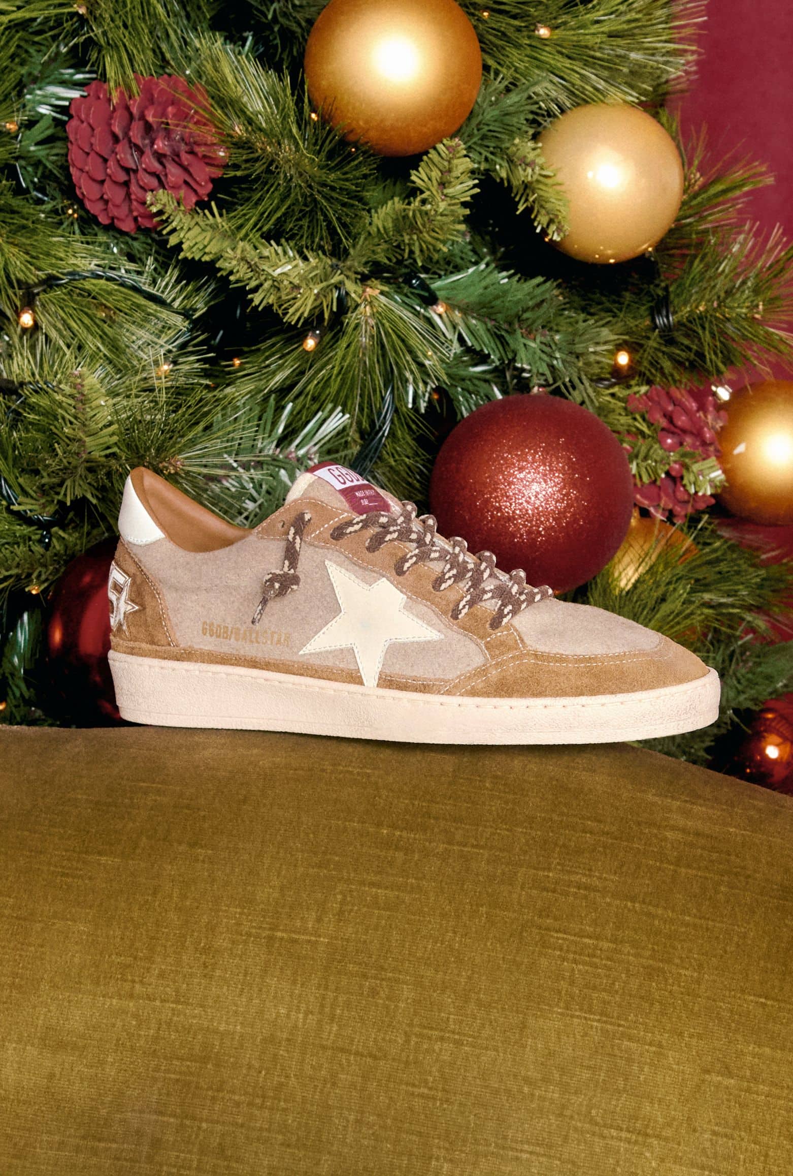 brown-and-beige-suede-ball-star-on-the-green-sofa