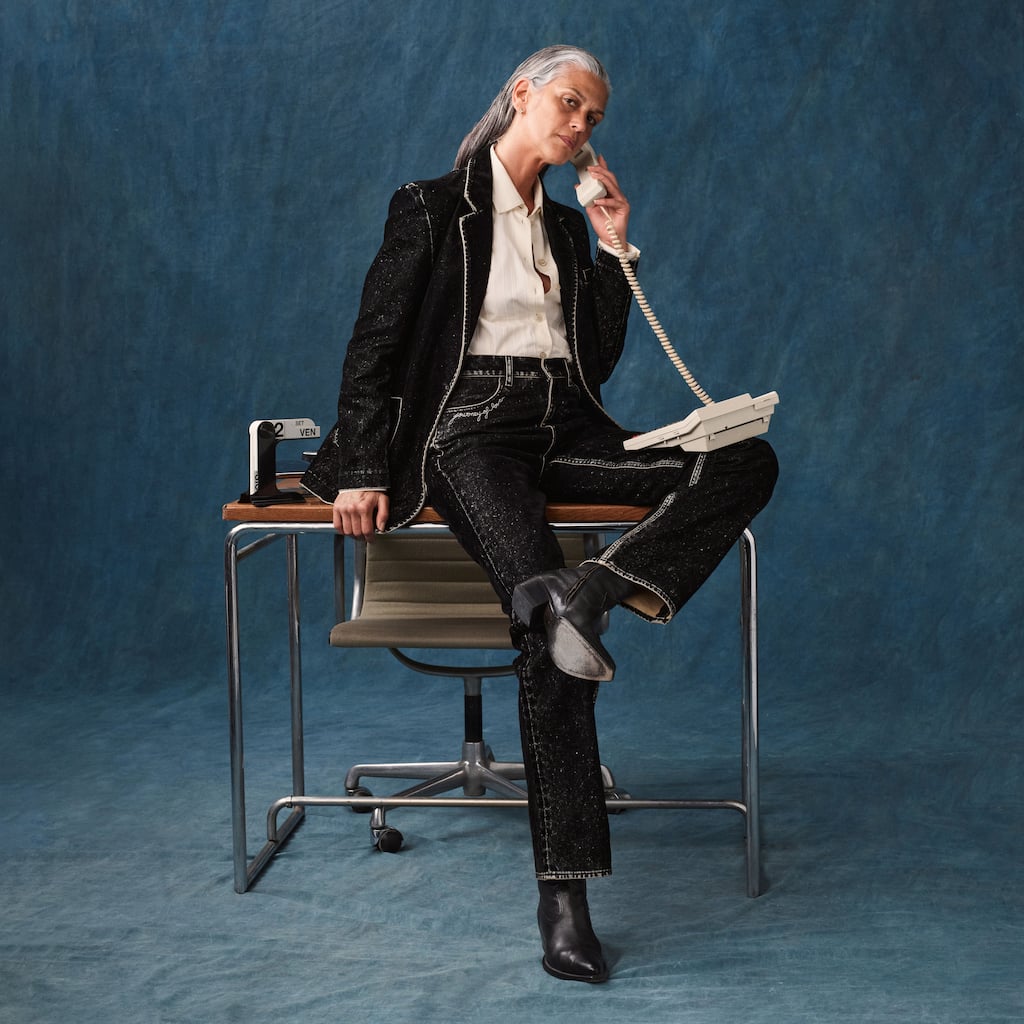 female-model-sit-on-a-desk