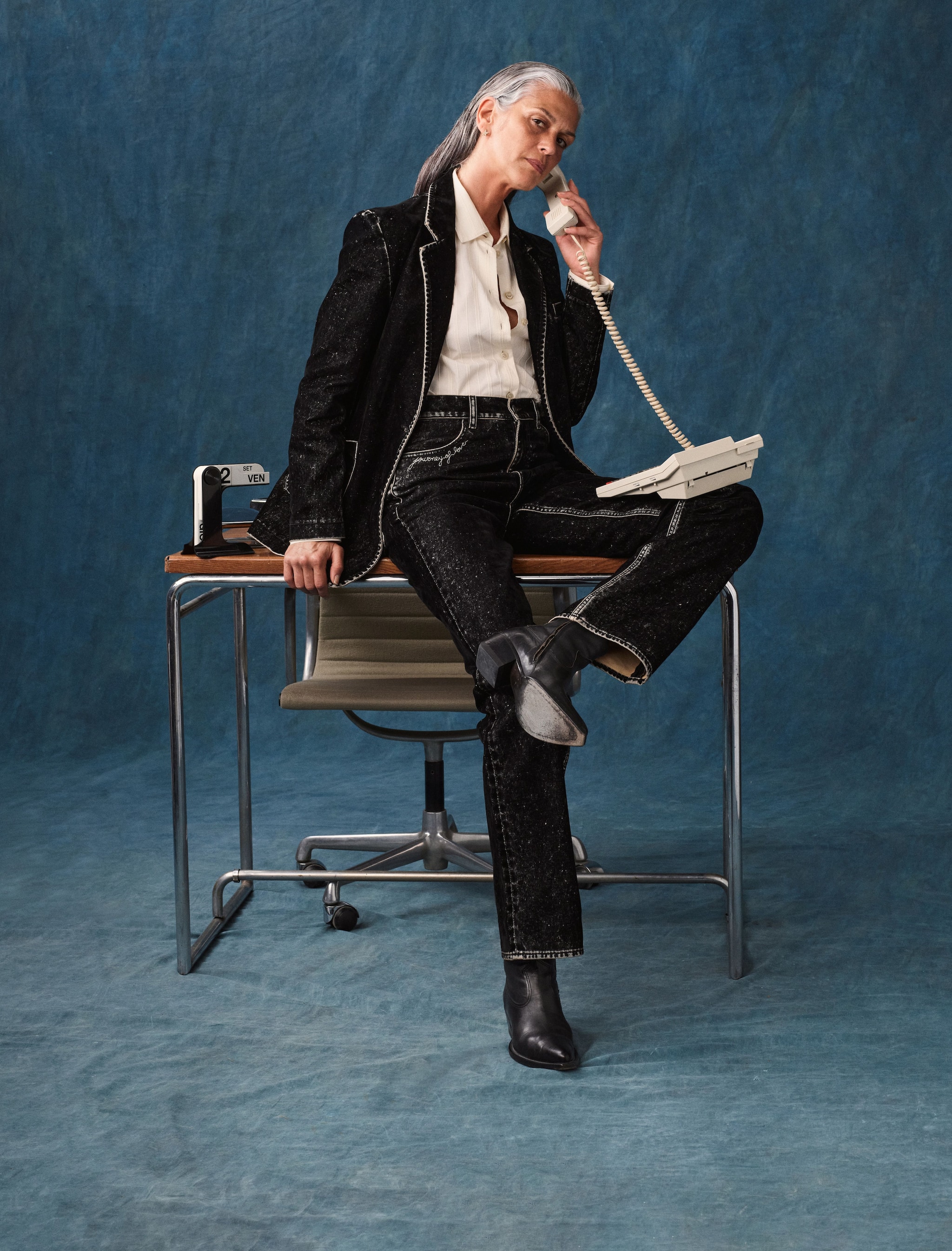 female-model-sit-on-a-desk