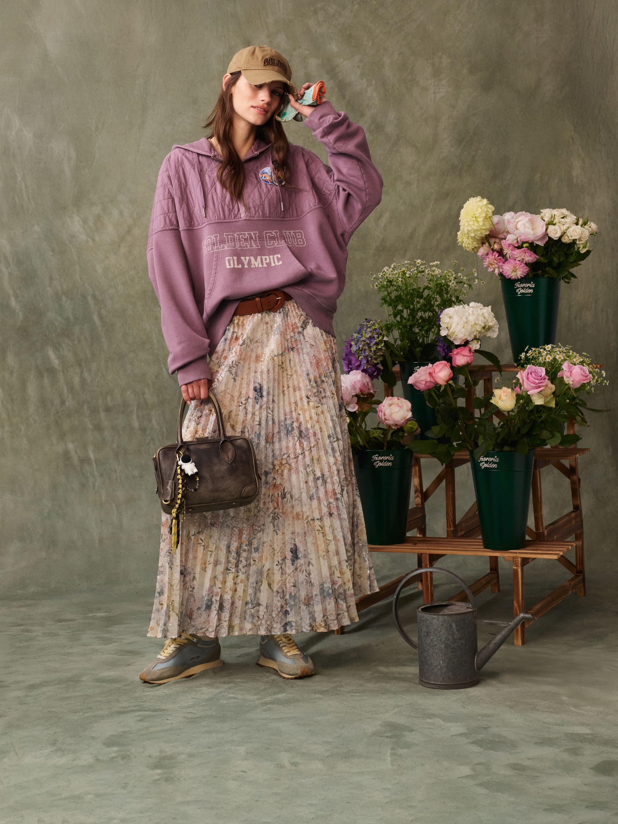 female-with-flowers-and-vita-brown-leather-bag