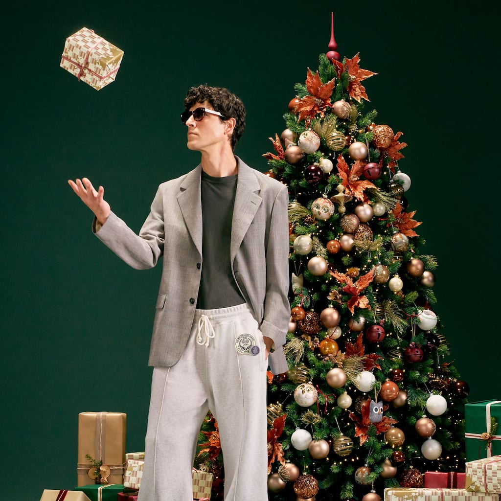 male-model-with-a-christmas-tree