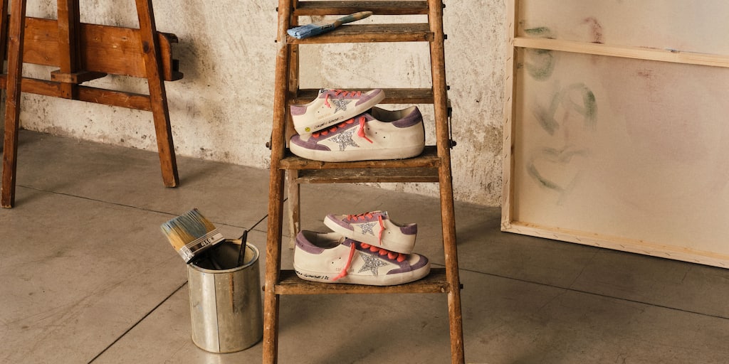 mini-me-super-star-above-a-ladder