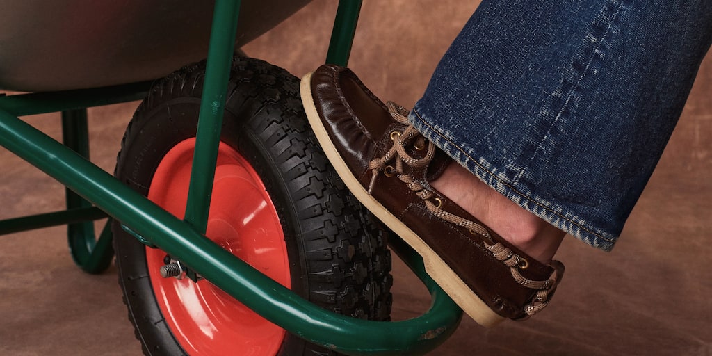 female-model-wearing-a-brown-leather-loafer