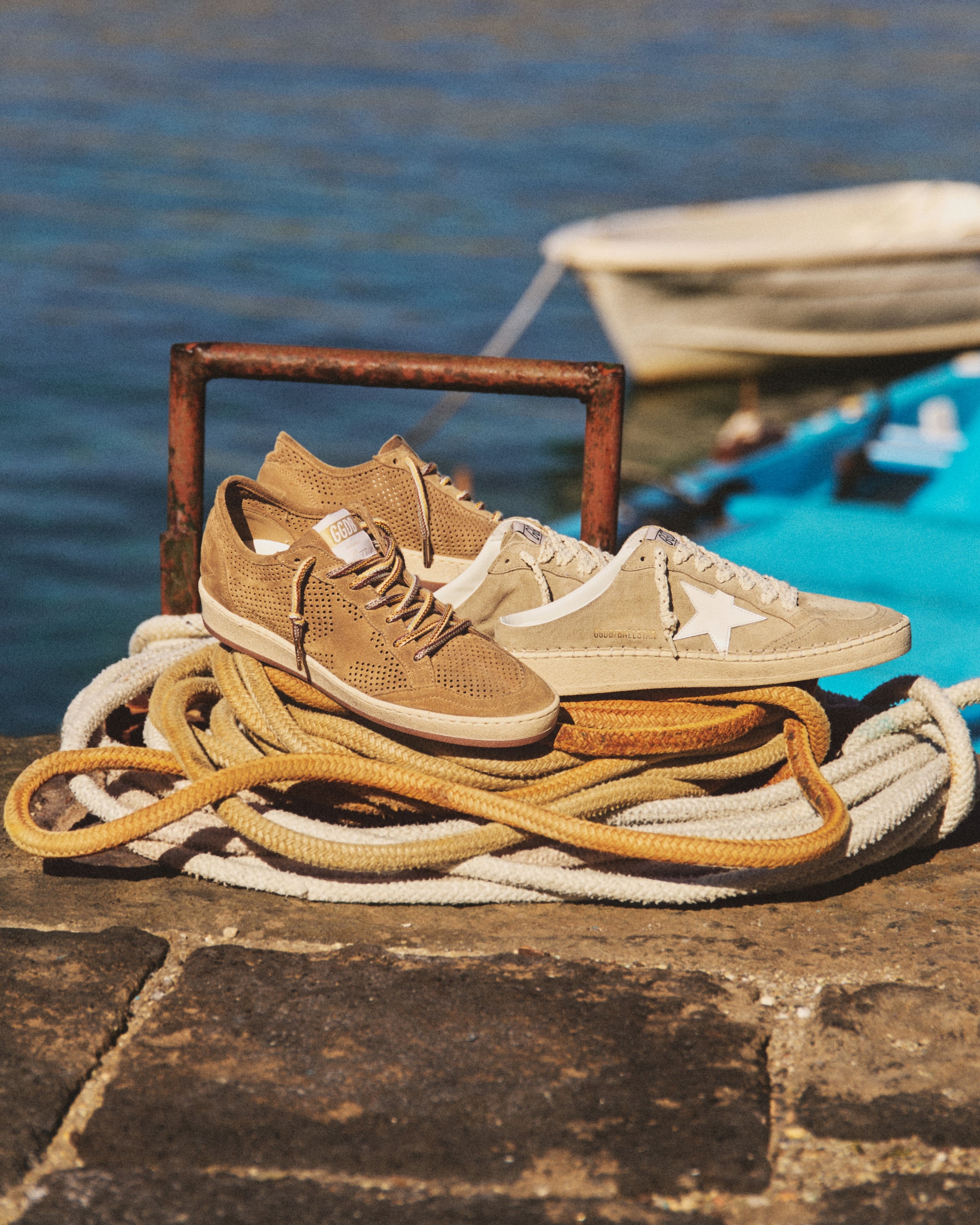 beige-sneakers-resting-on-top-of-a-fishing-line