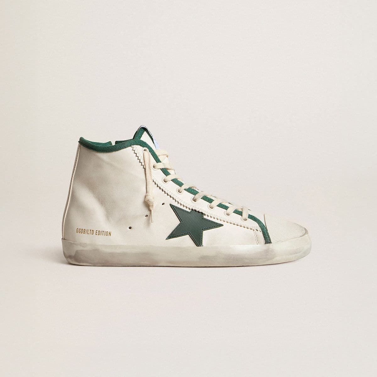 limited-edition-white-sneaker-with-green-star-and-details