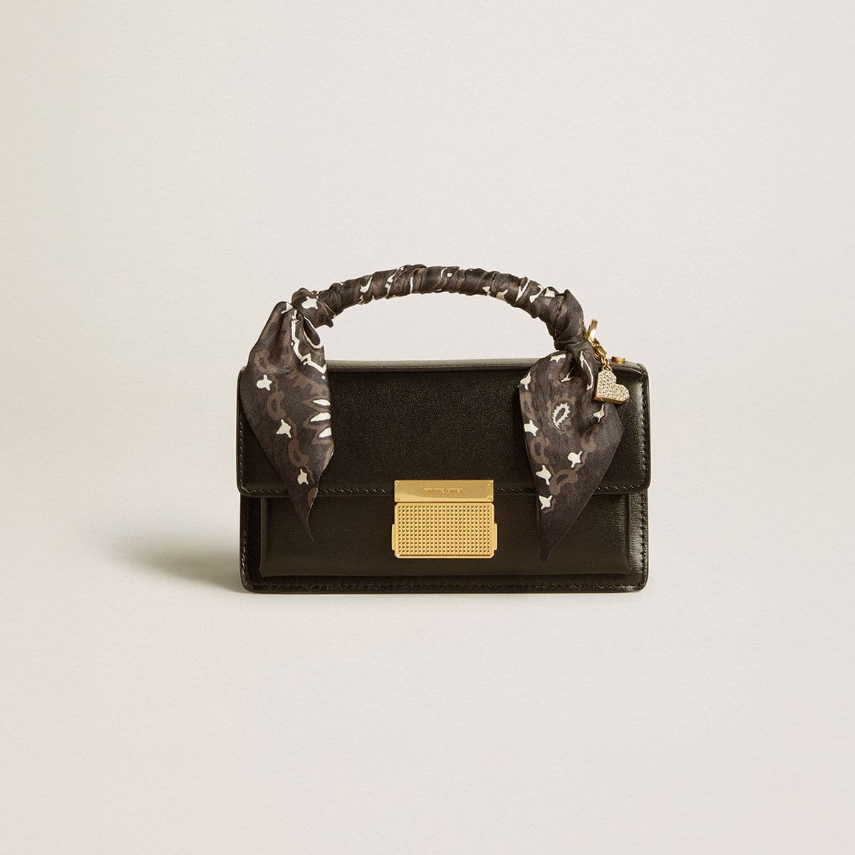 Small Venezia Bag-in-black-boarded-leather-with-silk-scarf-and-charm