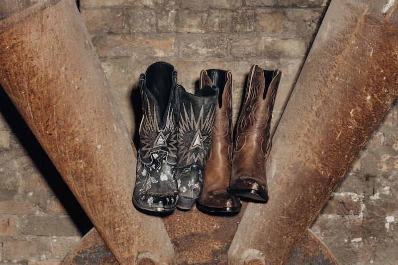 western-embroidered-boots-on-rusty-metal