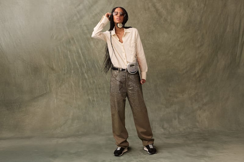 Women's-pair-of-grey-glittered-pants-and-white-shirt
