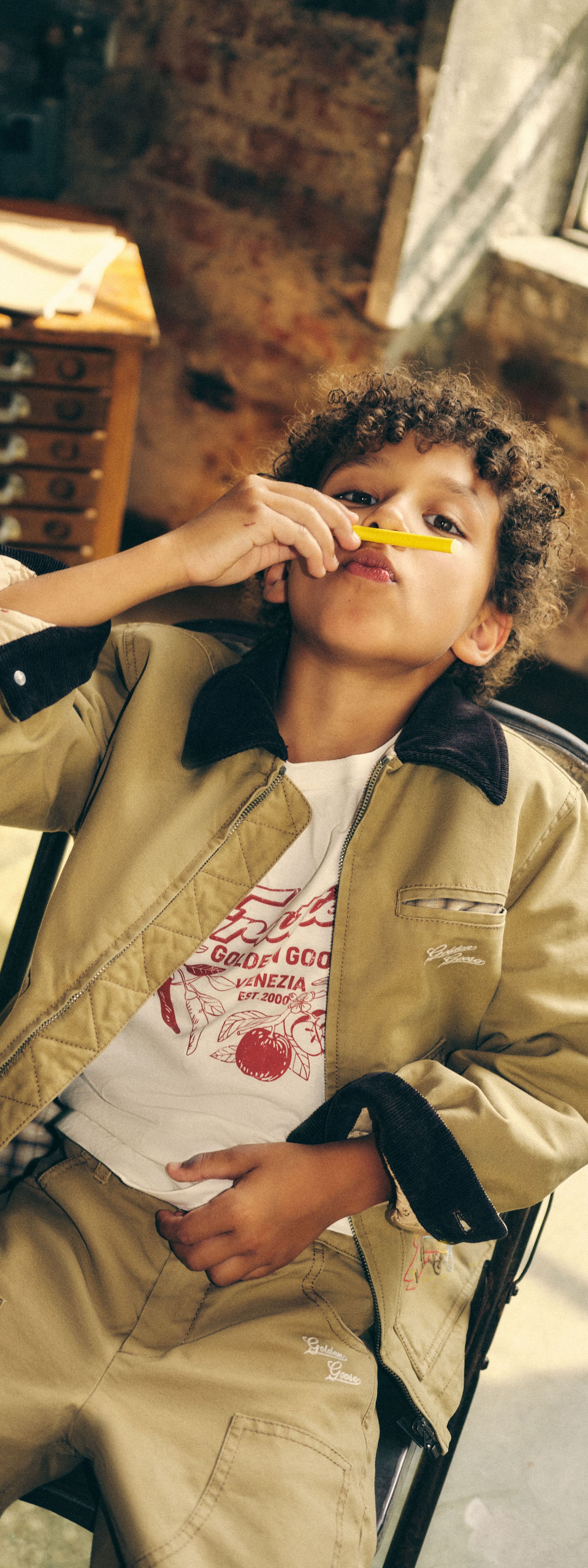 boy-playing-with-a-school-pen