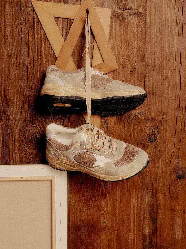 running-sneakers-hanging-on-the-wall