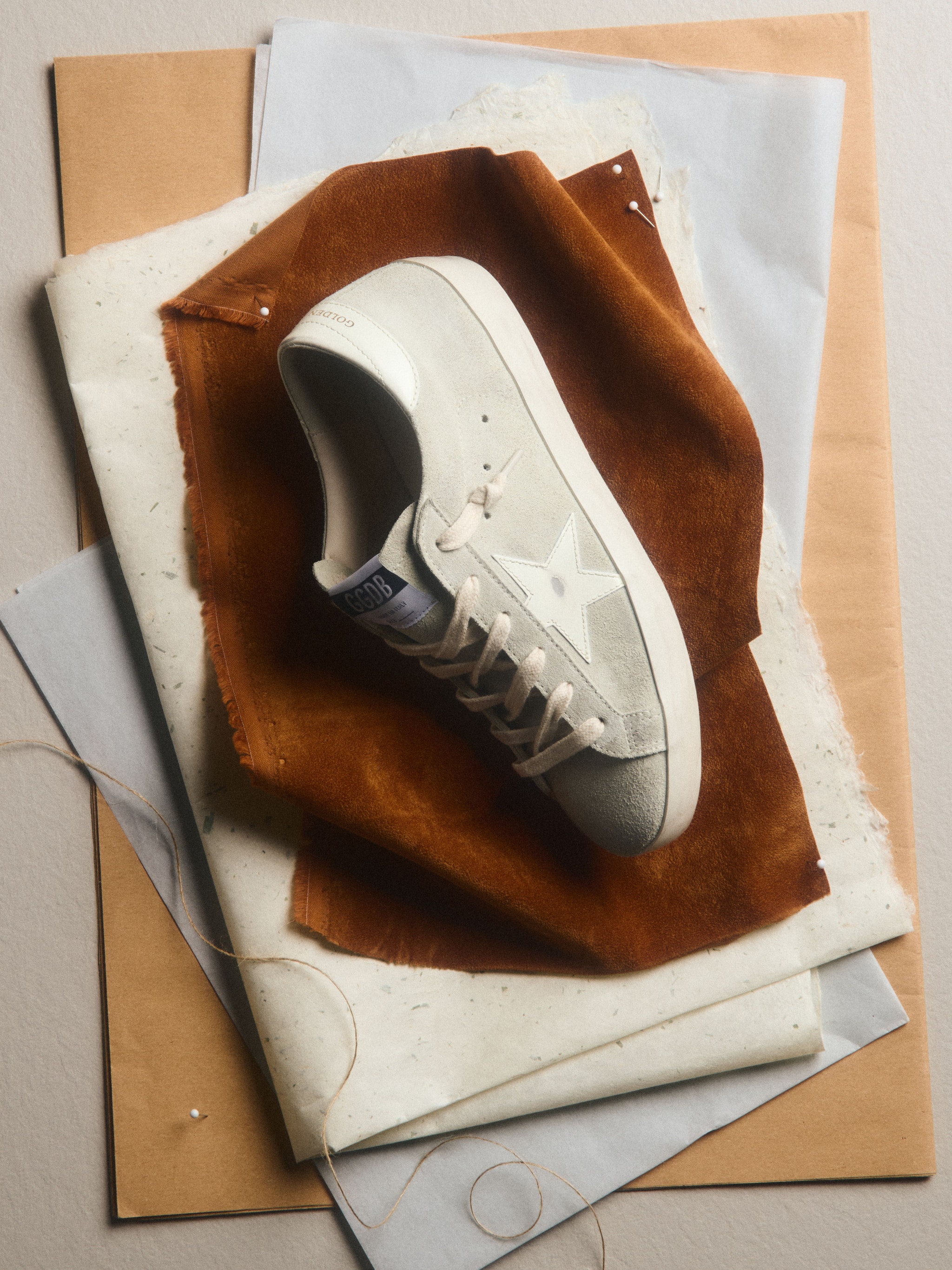 running-sneakers-hanging-on-the-wall