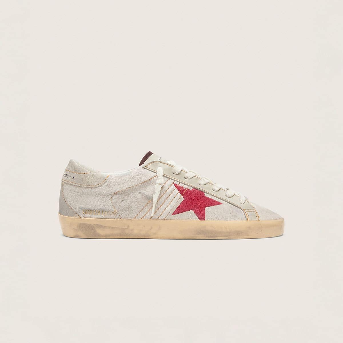 limited-ball-strar-sneakers-on-a-wooden-chair
