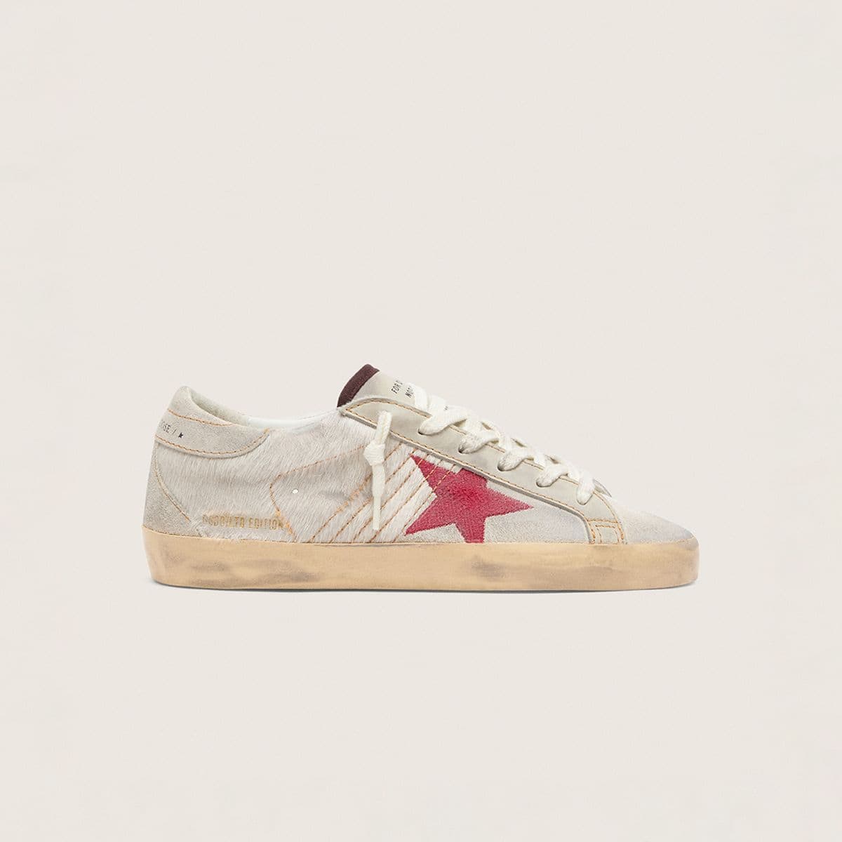 limited-ball-strar-sneakers-on-a-wooden-chair