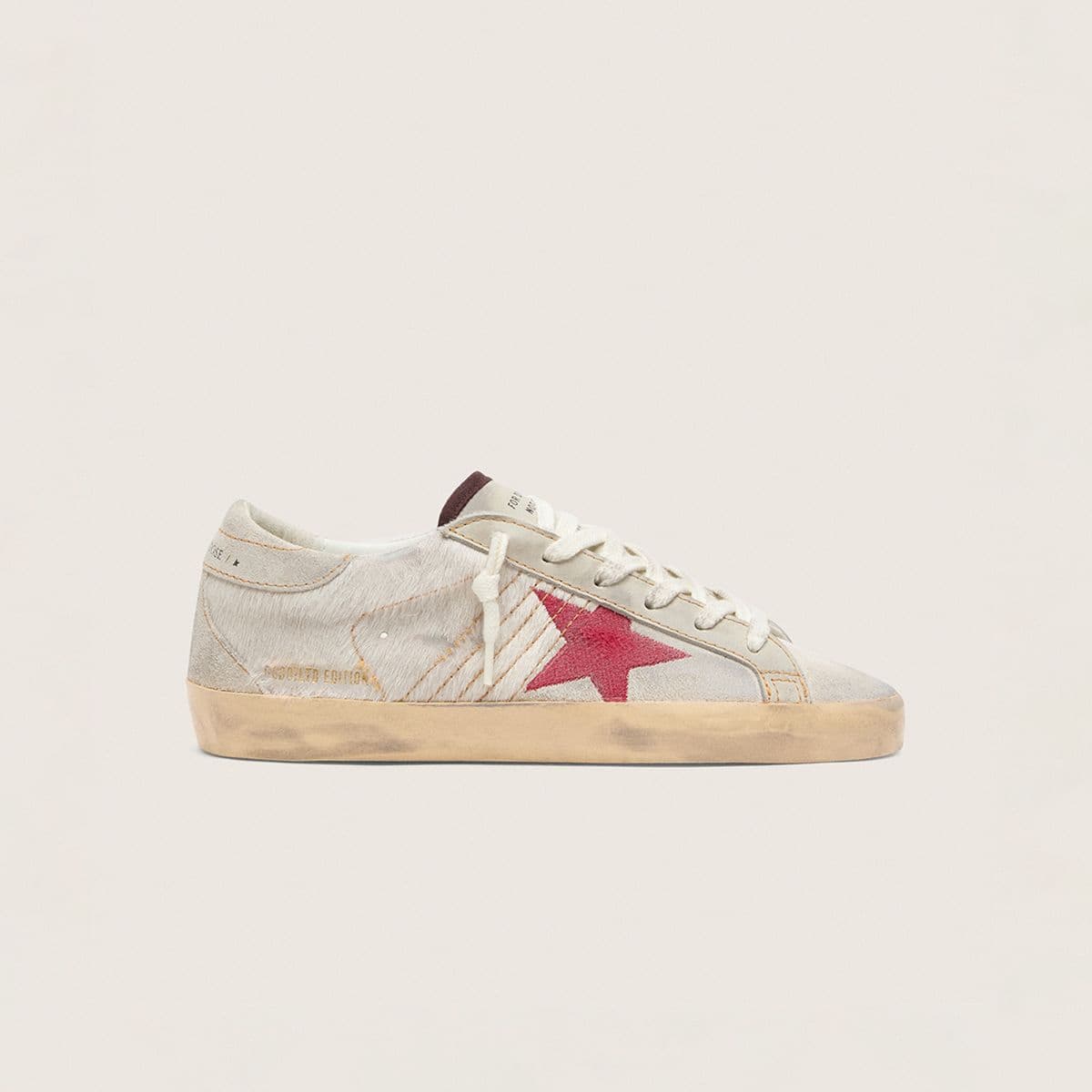 limited-ball-strar-sneakers-on-a-wooden-chair