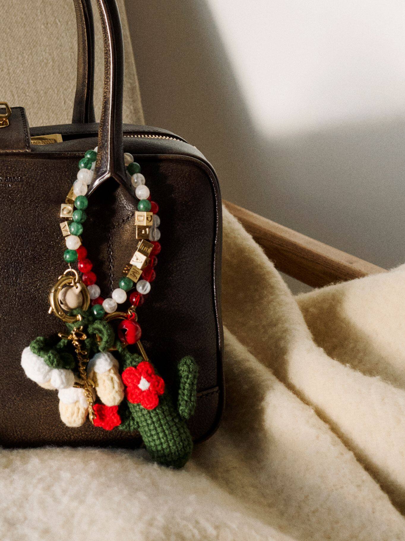 brown-leather-bag-with-coloured-charm-applied