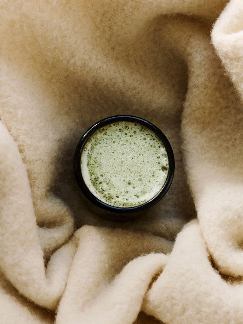 group-holding-model-bobby-banks-up-in-the-air-with-screen-in-the-background