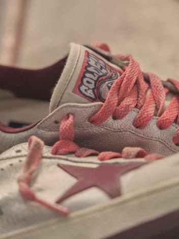 top-and-focused-view-of-white-and-pink-zhang-xin-ball-star-pro-sneakers