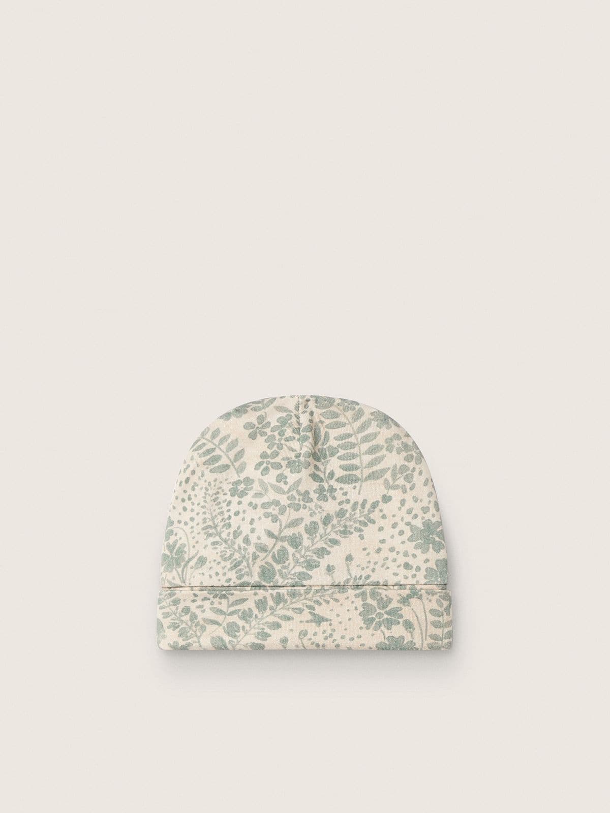 Conjunto para beb&eacute; de color crema con estampado floral verde salvia