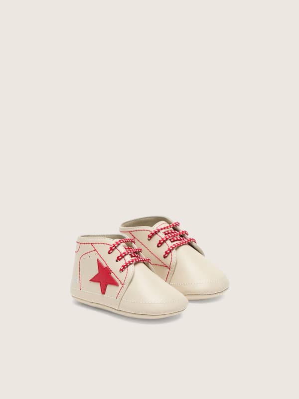 Baby New Born in white leather with red star and stitching