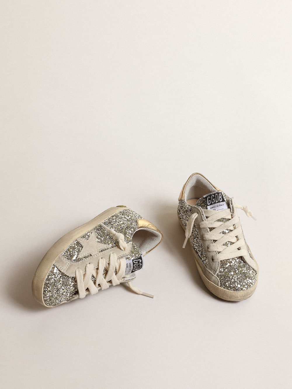 Golden Goose - Super-Star Junior in glitter with a suede star and gold heel tab in 