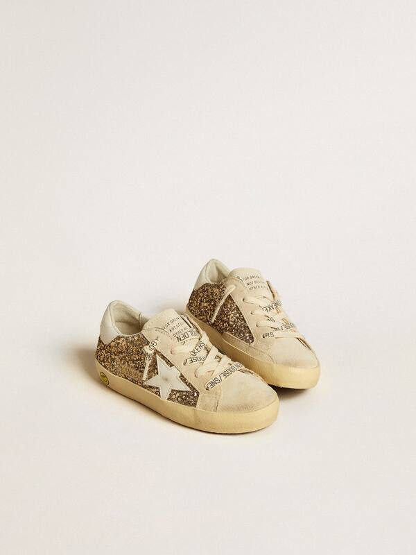 Golden Goose - Super-Star Junior in gold glitter with white leather star and heel tab in 