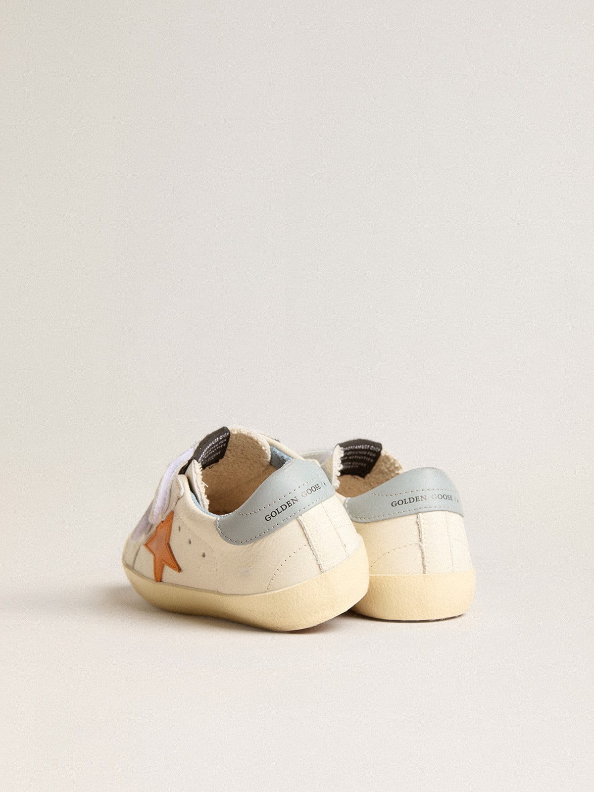 Junior Old School in leather with orange star and baby blue heel tab Golden Goose