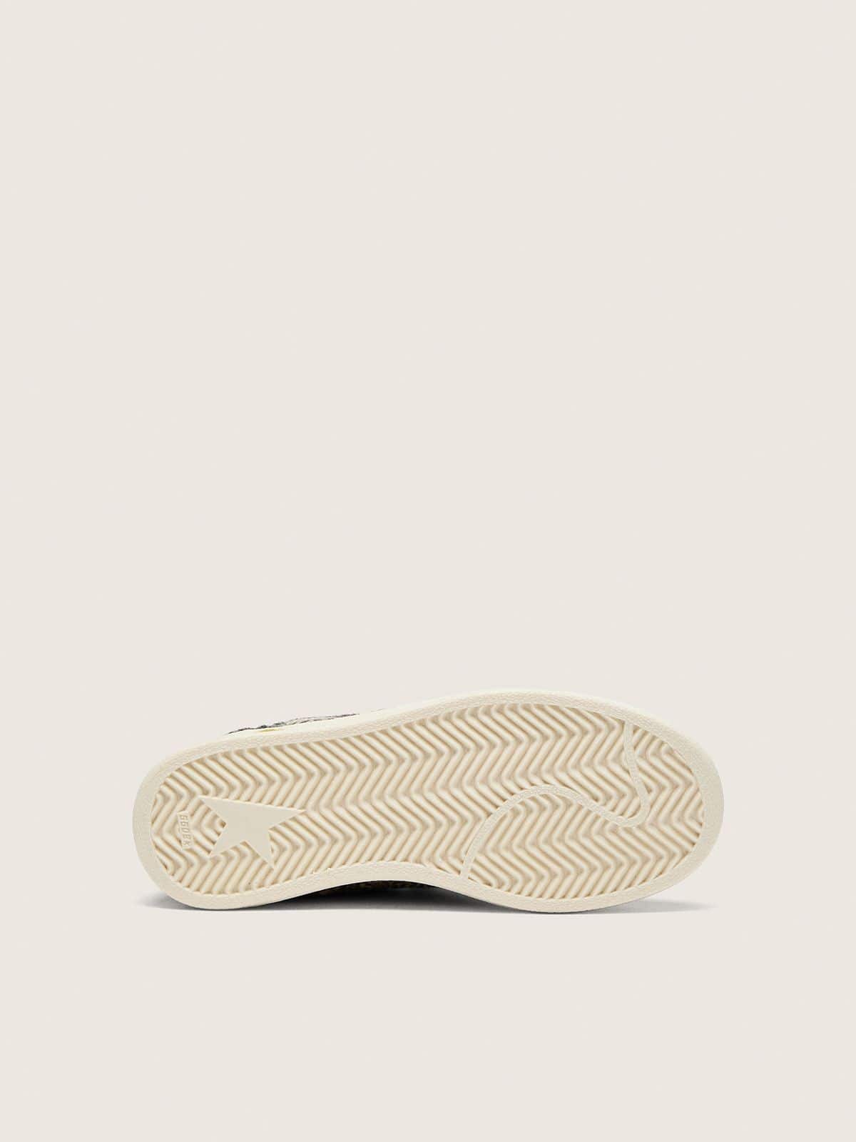 Golden Goose - Ball Star junior de couro cavalinho com estampa de leopardo branco e preto com estrela de couro creme in 