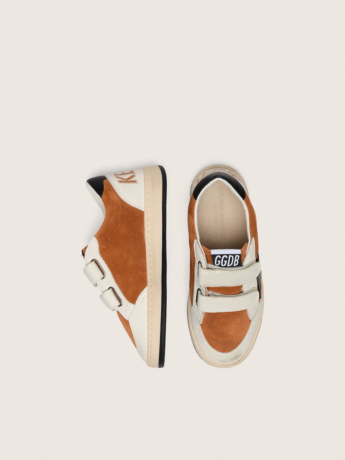 Junior Ball Star in brick-red suede and cream leather with black leather star