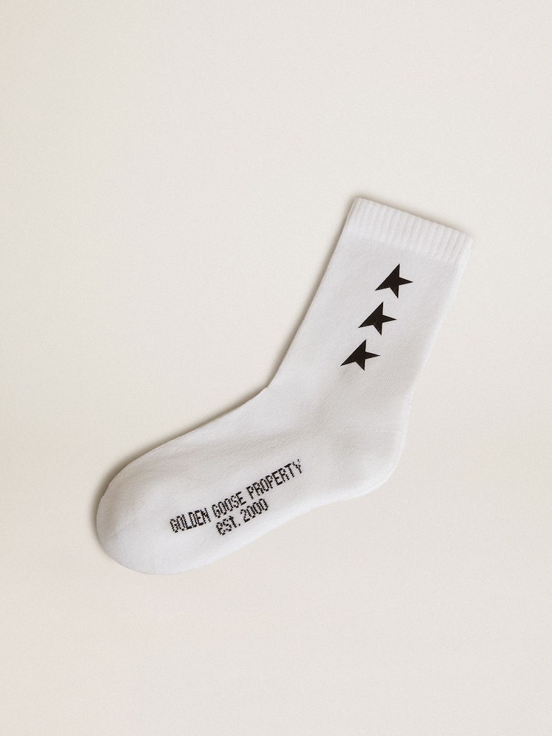 Wei&szlig;e Socken mit schwarzen Kontraststernen