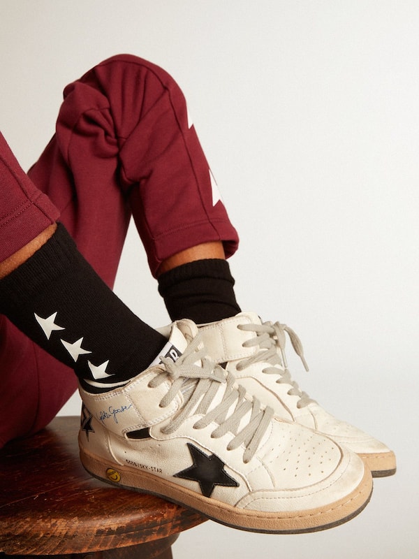 Golden Goose - Chaussettes noires avec &eacute;toiles blanches contrast&eacute;es in 